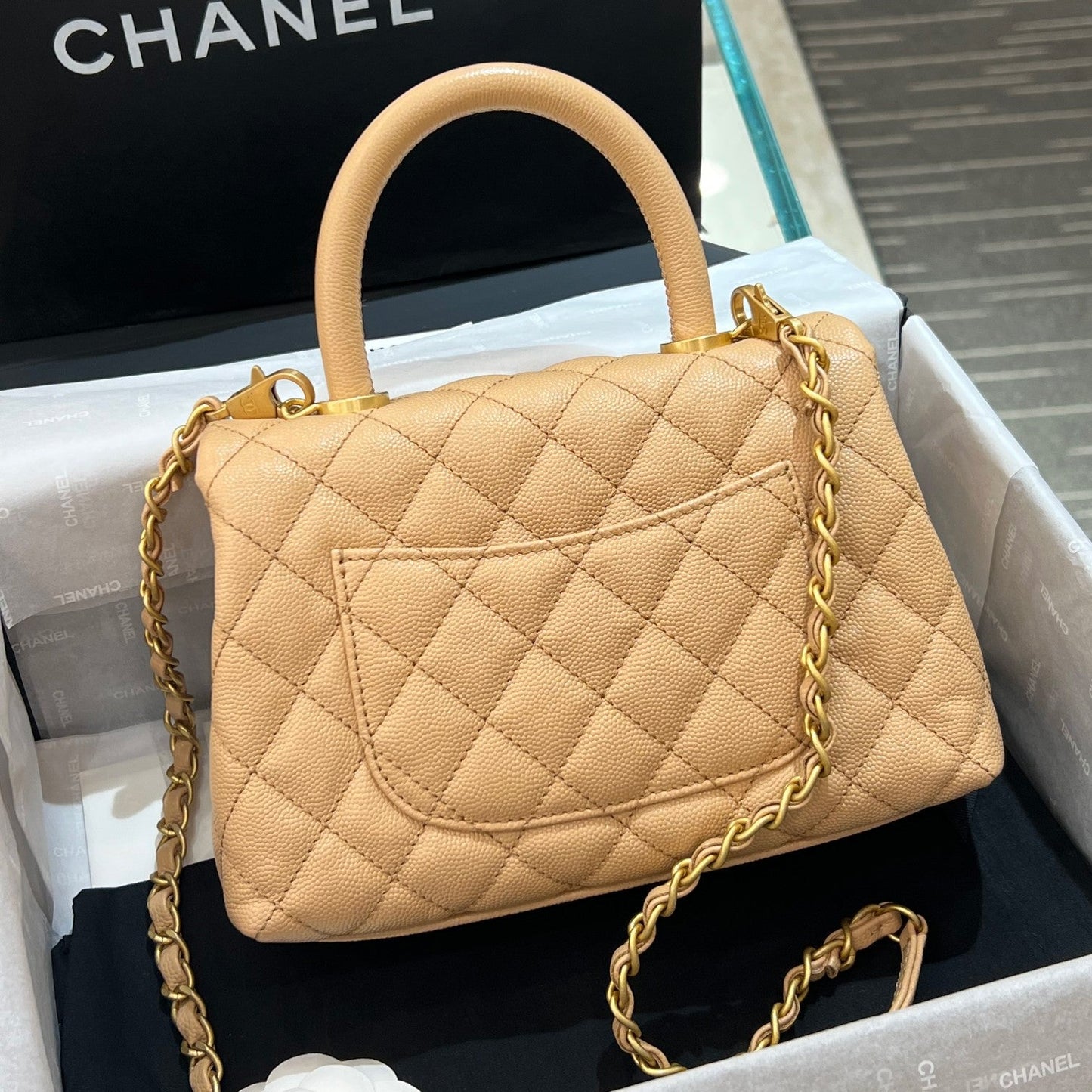 CH  FLAP BAG WITH TOP HANDLE 24  Small Grained Calfskin Light Teas