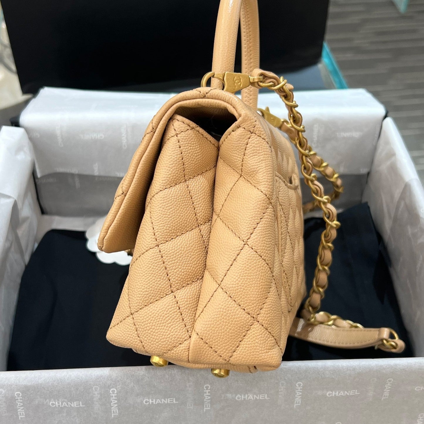 CH  FLAP BAG WITH TOP HANDLE 24  Small Grained Calfskin Light Teas