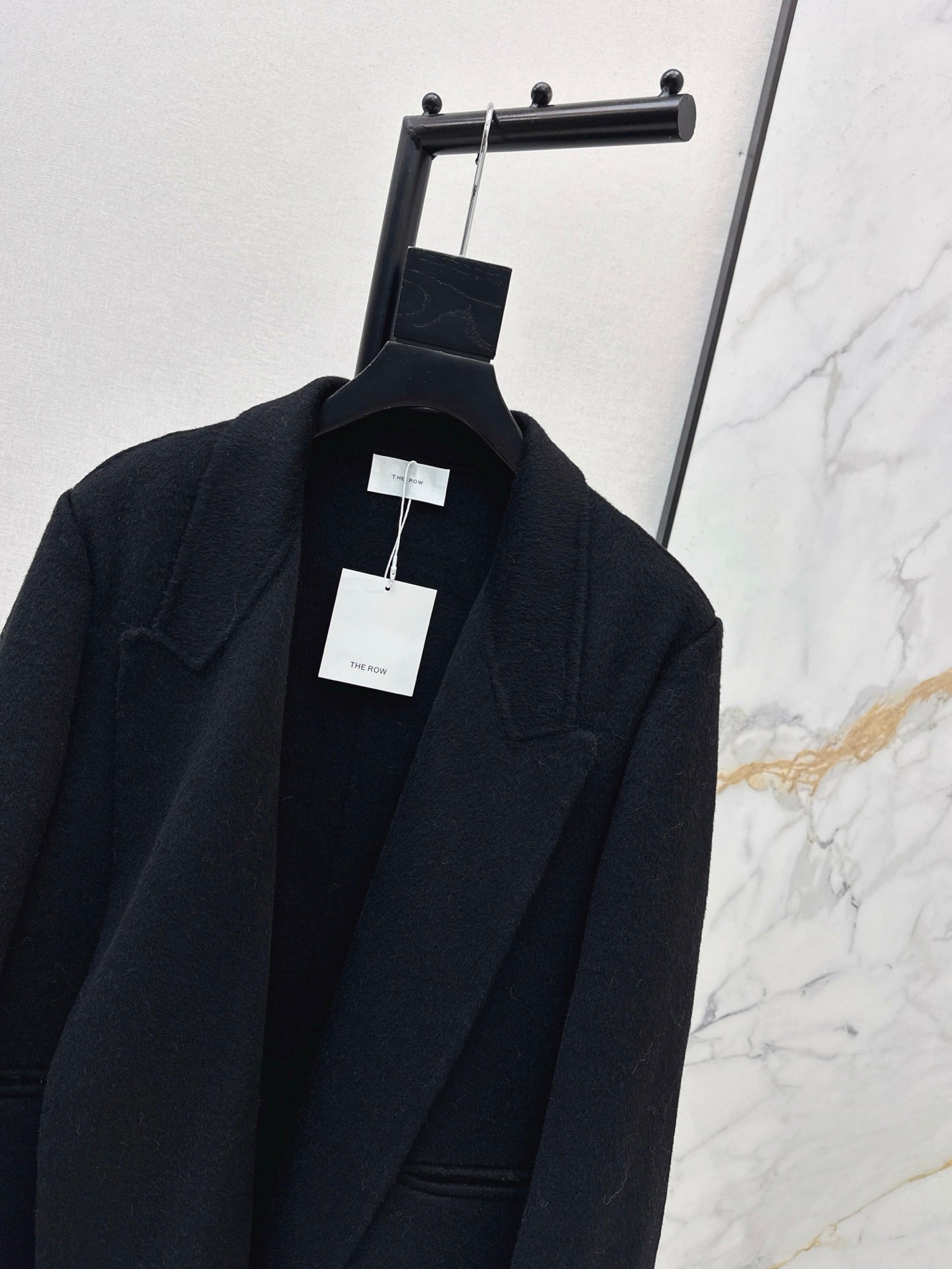 Row NEW woolen overcoats